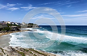 Cliffs along empty beach in Sidney Australia coastline photo