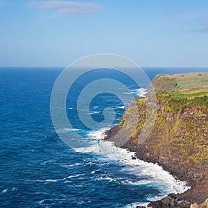 Cliffs and Atlantic ocean view from the observation deck Vigia das Baleias, Terceira. photo