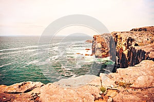 Cliffs by Atlantic Ocean in West Ireland with copy space.