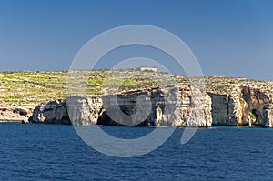Cliffs of Comino island or Kemmuna in Mediterranean Sea, Malta