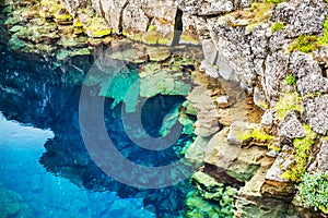 Cliffs and deep fissure in Thingvellir National Park, Iceland