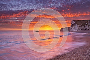 Cliffs at Durdle Door beach in Southern England at sunset