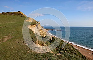 Cliffs at the the English town of Seatown in Dorset on the Jurassic coast. On the coastal path between Charmouth and West Bay. photo