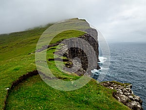 Cliffs of Faroe Islands. Ocean below.