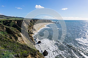 Cliffs and large half moon shaped beach, Pacific Ocean Coast, Half Moon Bay, California