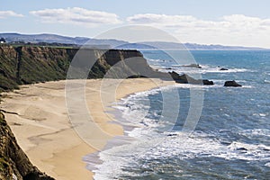 Cliffs and large half moon shaped beach, Pacific Ocean Coast, Half Moon Bay, California