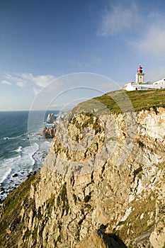 Cliffs and lighthouse of Cabo da Roca on the Atlantic Ocean in Sintra, Portugal, the westernmost point on the continent of photo