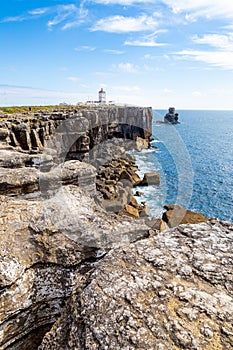 Cliffs and lighthouse of Carvoeiro cape in Peniche