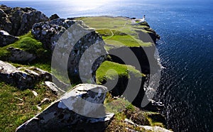 Cliffs and lighthouse, scotland