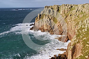 The cliffs and Longships Lighthouse Lands End Cornwall, UK