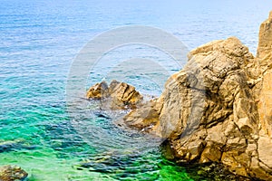 Cliffs of the Mediterranean Sea in cloudy weather in Lloret de Mar, Costa Brava