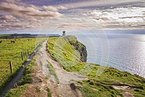 The Cliffs of Moher looking to O`Brien`s Tower, in Clare, Ireland