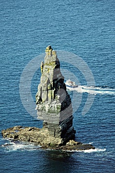 Cliffs of Moher in sunny and cloudy day, seashore of West Ireland, Wild Atlantic Road
