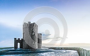 Cliffs of Moher at sunset - O Briens Tower in Co. Clare Ireland Europe.