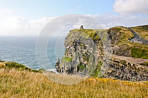 Cliffs of Moher, view with O`Brien`s Tower, county Clare, Ireland