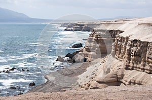 Cliffs near La Portada Natural Monument, Chile photo