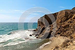Cliffs next to Los Amarillos cove in the Mediterranean Sea. photo