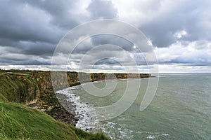 These cliffs at Pointe du Hoc on the Normandy coast near the town of Saint-Pierre-du-Mont had to be climbed by the Americans with