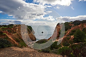 The cliffs of Praia Joao de Arens beach photo