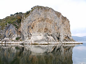 Cliffs reflecting in ocean