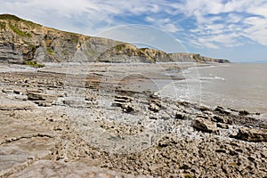 Cliffs, rock formations and beach at Southerndown on Wales` Glamorgan Heritage Coast