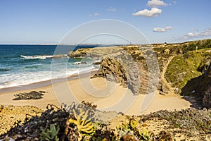 Cliffs and sand on Cerca Nova Beach, Alentejo, Portugal