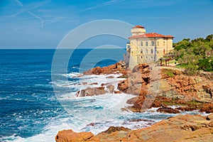 Cliffs of the Tuscan coast, overlooking the sea stands the castle of Boccale, medieval manor with watchtower in Livorno