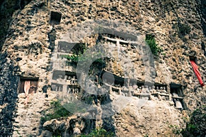 Cliffside effigies in Sulawesi