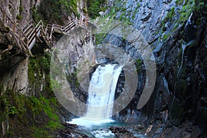 Cliffside steps near waterfall