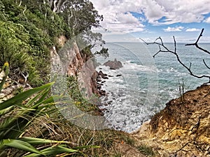 A clifftop view of Pacific ocean shore in New Zealand