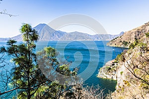 Clifftop view of volcano & Lake Atitlan, Guatemala photo