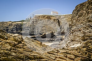 Cliffy beach in Zambujeira Do Mar, Vincentina Coast Natural Park, Alentejo, Portugal photo