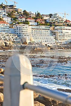 Clifton, Cape Town, South Africa panorama seascape with clouds, blue sky, Fancy hotels, and apartment buildings in the