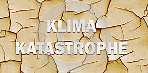 Climate change banner with CLIMATE CATASTROPHE lettering in German