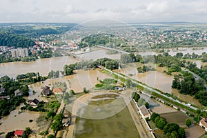 Climate change and the effects of global warming. Flooded village, farms and fields after heavy rains. Environmental natural