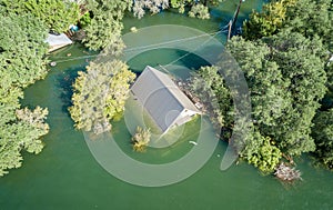 Climate Change Flooding with a House Under water