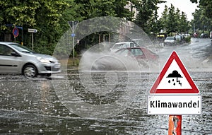Climate Change German Warn Sign