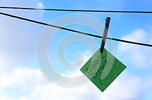 Climate change, global warming concept, post it note, washing line