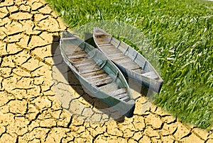 Climate change greenhouse effect boats soil grass