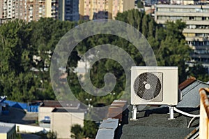 Climatic machine over the roof photo