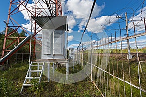 Climatic vandal-proof cabinets with microwave equipment and power cables, coaxial cables, optic fibers are installed