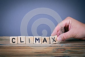 Climax, wooden letters on the office desk