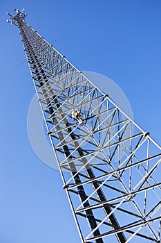 Climber ascending the cellular tower