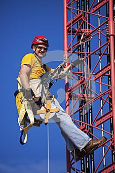 Climber ascending the cellular tower