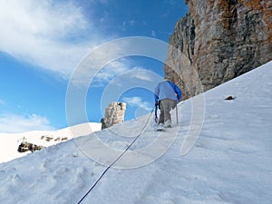 Climber ascending on Rolando Breach. Pyrenees. Spain