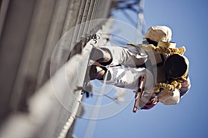 Climber on cell tower