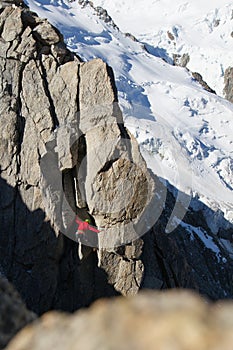 Climber climbing on granite