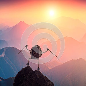 A climber egg standing on a mountain top