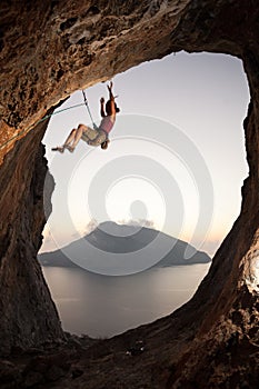 Climber falling of a cliff while lead climbing