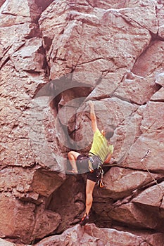 Climber girl on rock